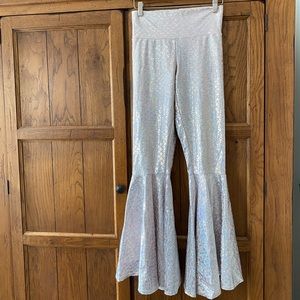 Fish skin bell bottom print leggings! Worn once. Super cute. Pink and silver.